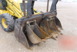 New Holland LB110-4PT